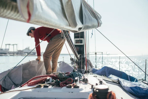 sailor-works-on-deck-of-sailboat-or-yacht-2026-01-05-00-55-22-utc